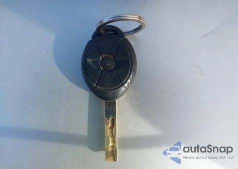 2005 Mini Cooper z USA, uszkodzony, nr VIN WMWRC33415TC58743